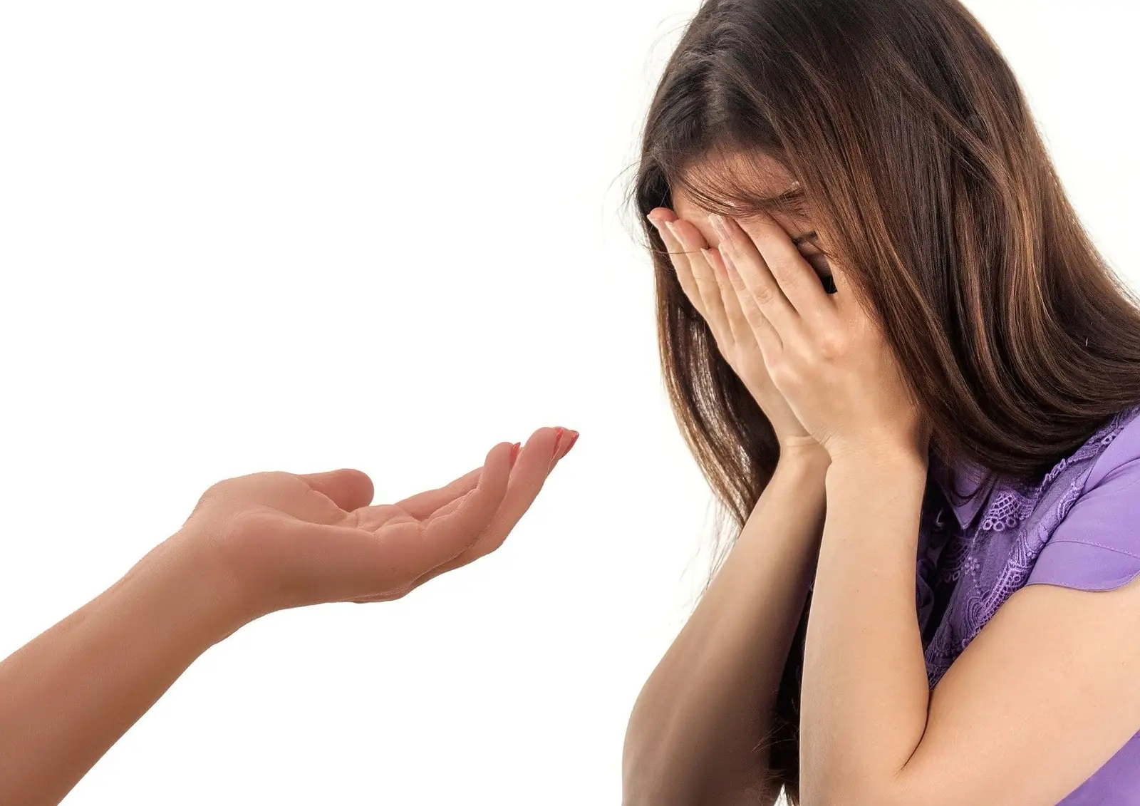 A distressed woman covering her face, reflecting the weight of polysubstance use