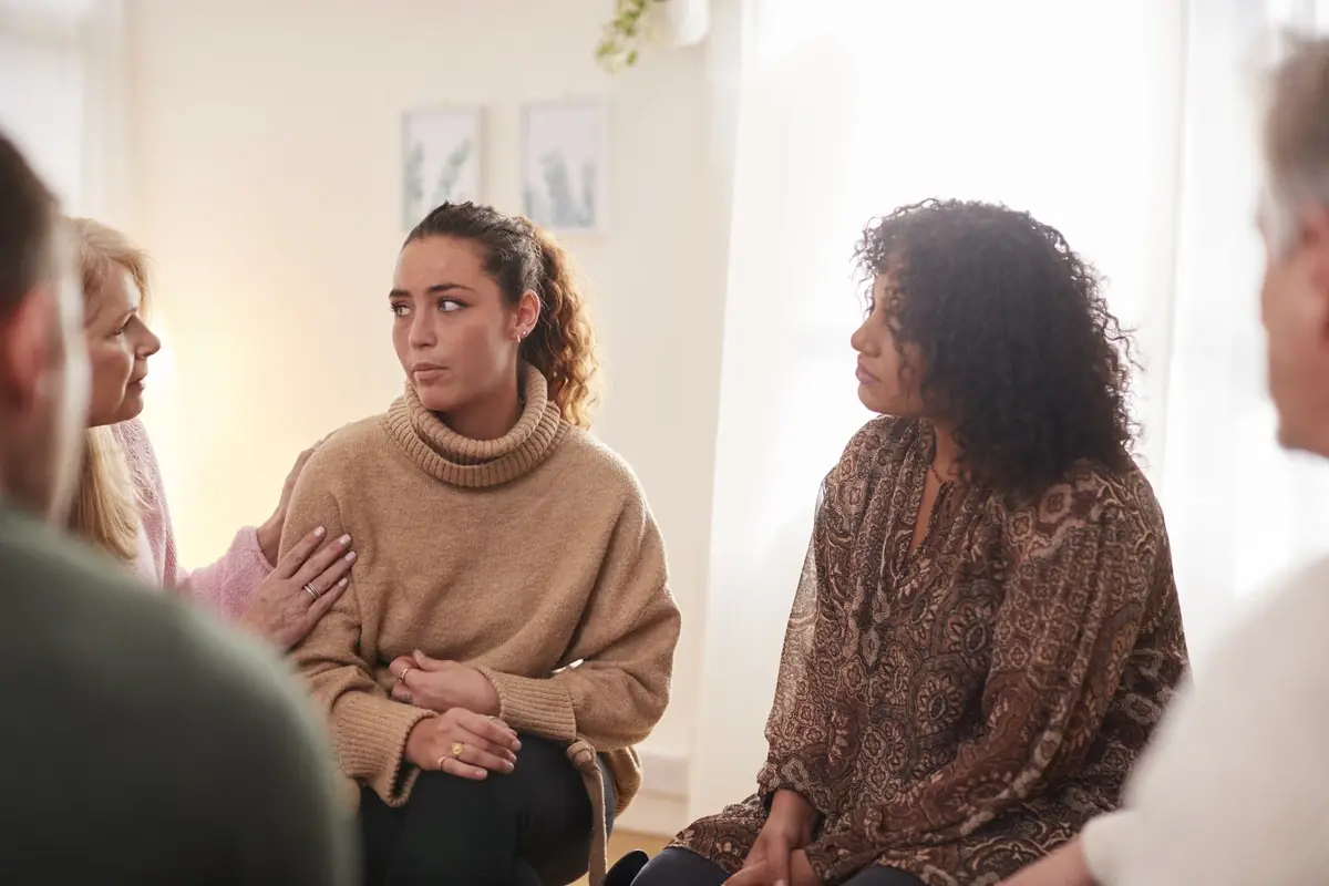 Women talking together in a recovery support group