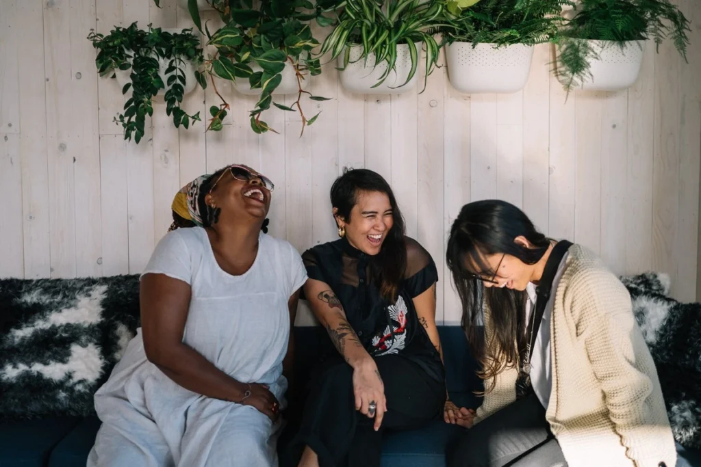 planning a sober girls get together - three women laughing together