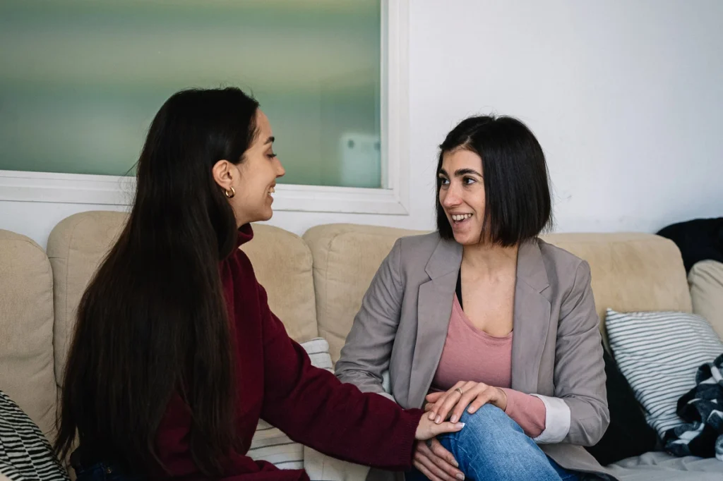 Approaching a Loved One About Their Addiction - two women sitting down and talking