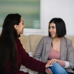 Approaching a Loved One About Their Addiction - two women sitting down and talking