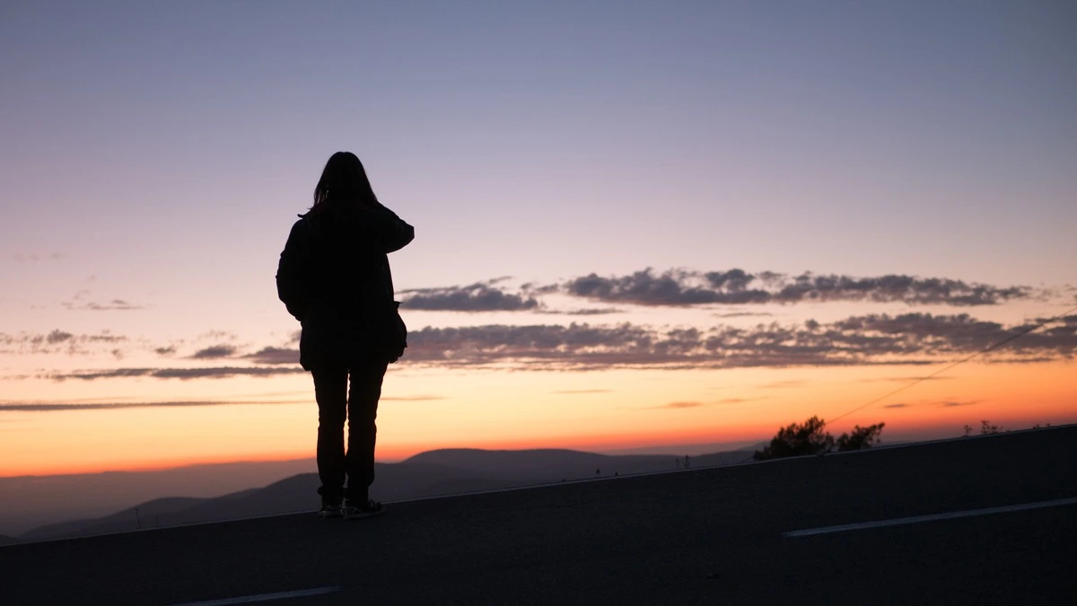 Dual-diagnosis - silhouette of woman walking